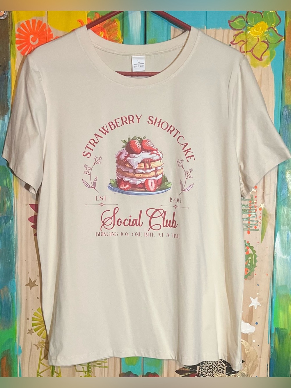 Strawberry Shortcake Social Club Graphic Tee
|Cream & Pink